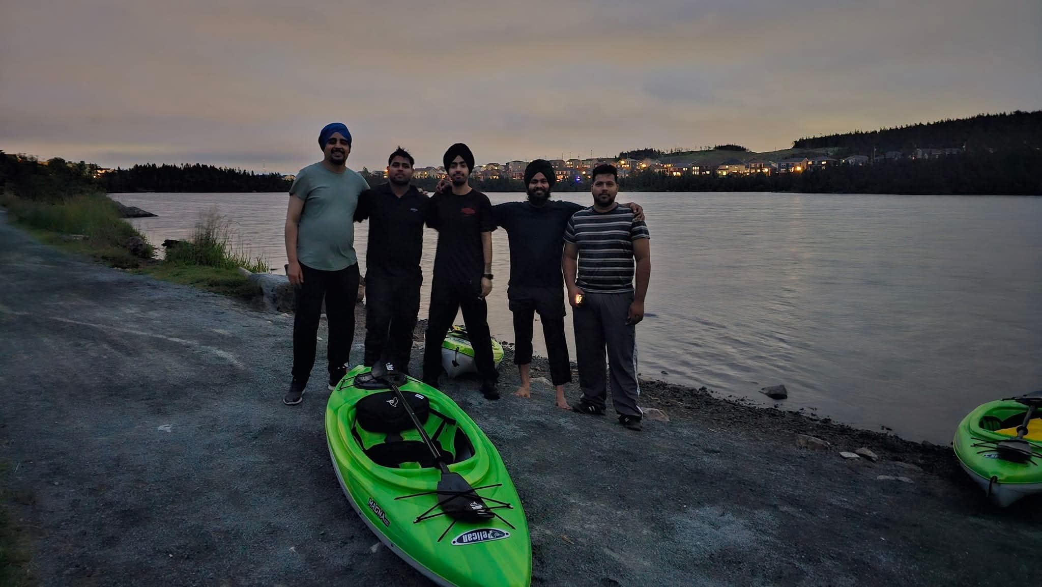Paradise Paddles group and illuminated private event photo.